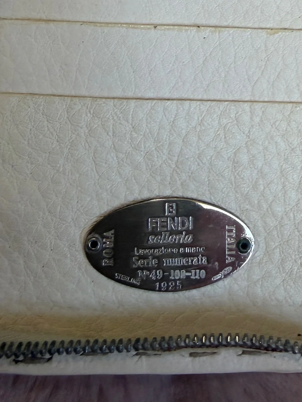 Fendi Silver Logo Plaque on Cream Leather